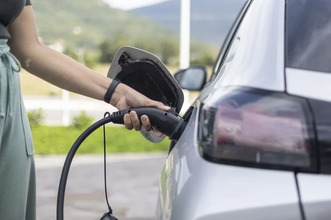 Woman Charging EV