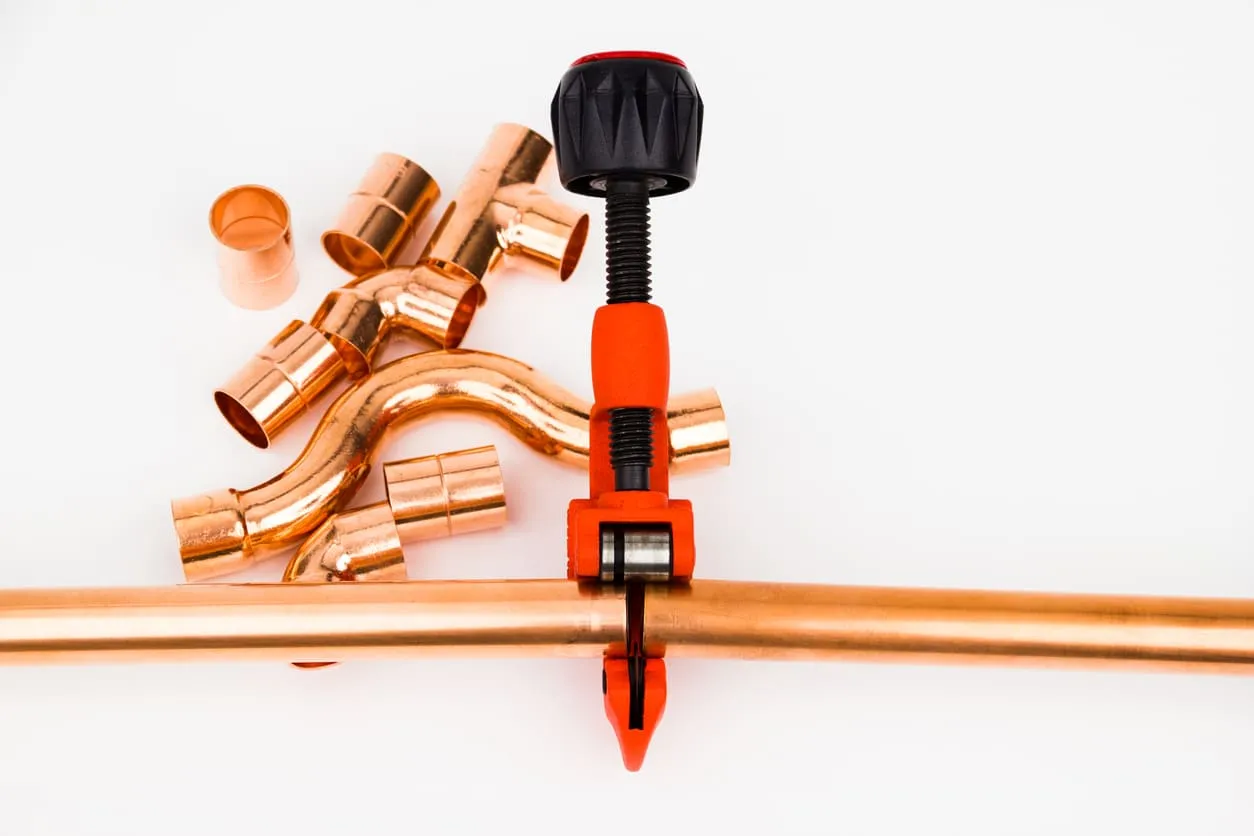 Plumber Crimping Pipe